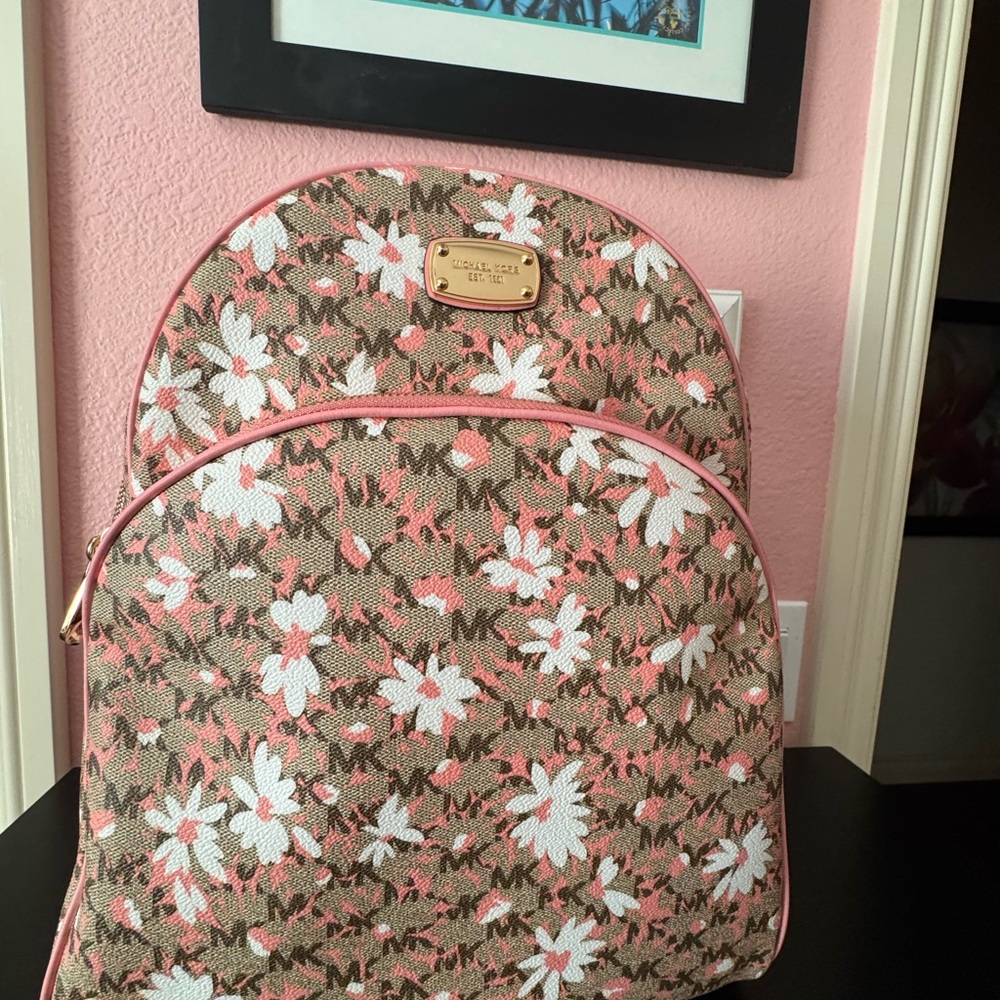 NWOT.  Never Been used Michael Kors Pink ABBEY Floral Backpack
